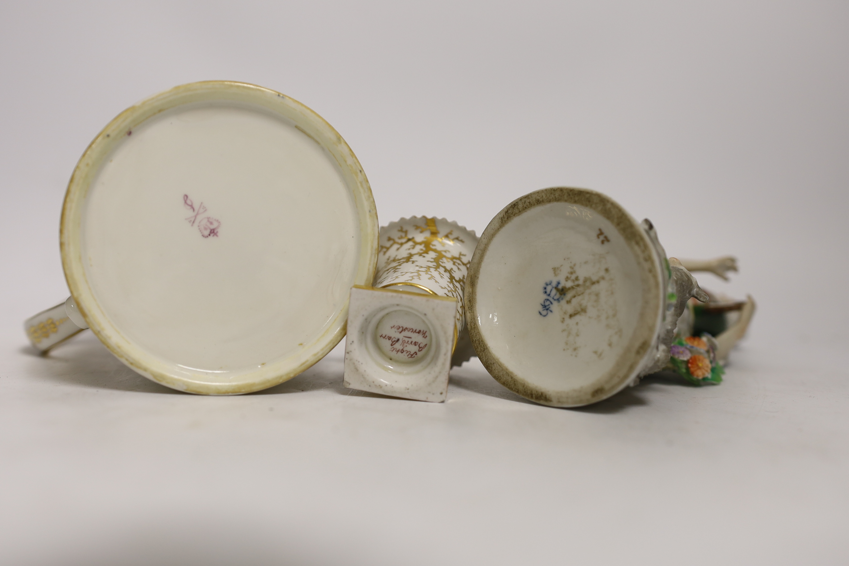 Four porcelain items - a small Flight Barr & Barr Worcester she’ll painted vase, a Derby mug, a Royal Crown Derby dish and a Sitzendorf figure, 16cm